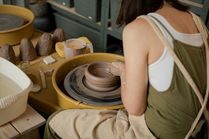 A potter at work at the wheel