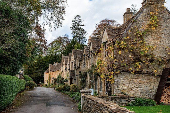 A Cotswold village in autumn mist